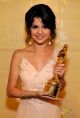 Selena Gomez poses with her Year in Television Comedy Actress award for "Wizards of Waverly Place" during the 2009 ALMA Awards held at Royce Hall on September 17, 2009 in Los Angeles, California.