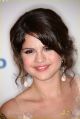 Selena Gomez poses with her Year in Television Comedy Actress award for "Wizards of Waverly Place" during the 2009 ALMA Awards held at Royce Hall on September 17, 2009 in Los Angeles, California.