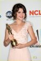 Selena Gomez poses with her Year in Television Comedy Actress award for "Wizards of Waverly Place" during the 2009 ALMA Awards held at Royce Hall on September 17, 2009 in Los Angeles, California.