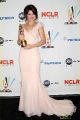 Selena Gomez poses with her Year in Television Comedy Actress award for "Wizards of Waverly Place" during the 2009 ALMA Awards held at Royce Hall on September 17, 2009 in Los Angeles, California.